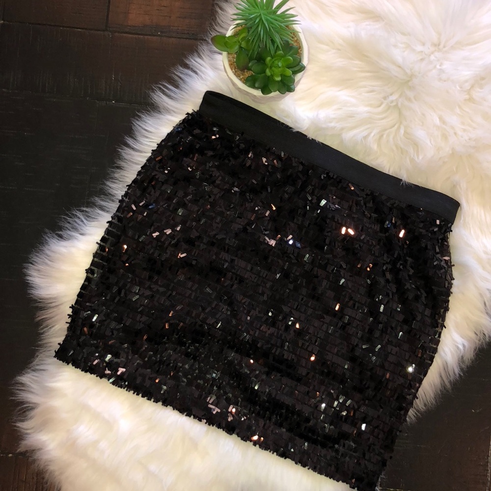 Medium Joe Fresh black sequence skirt.